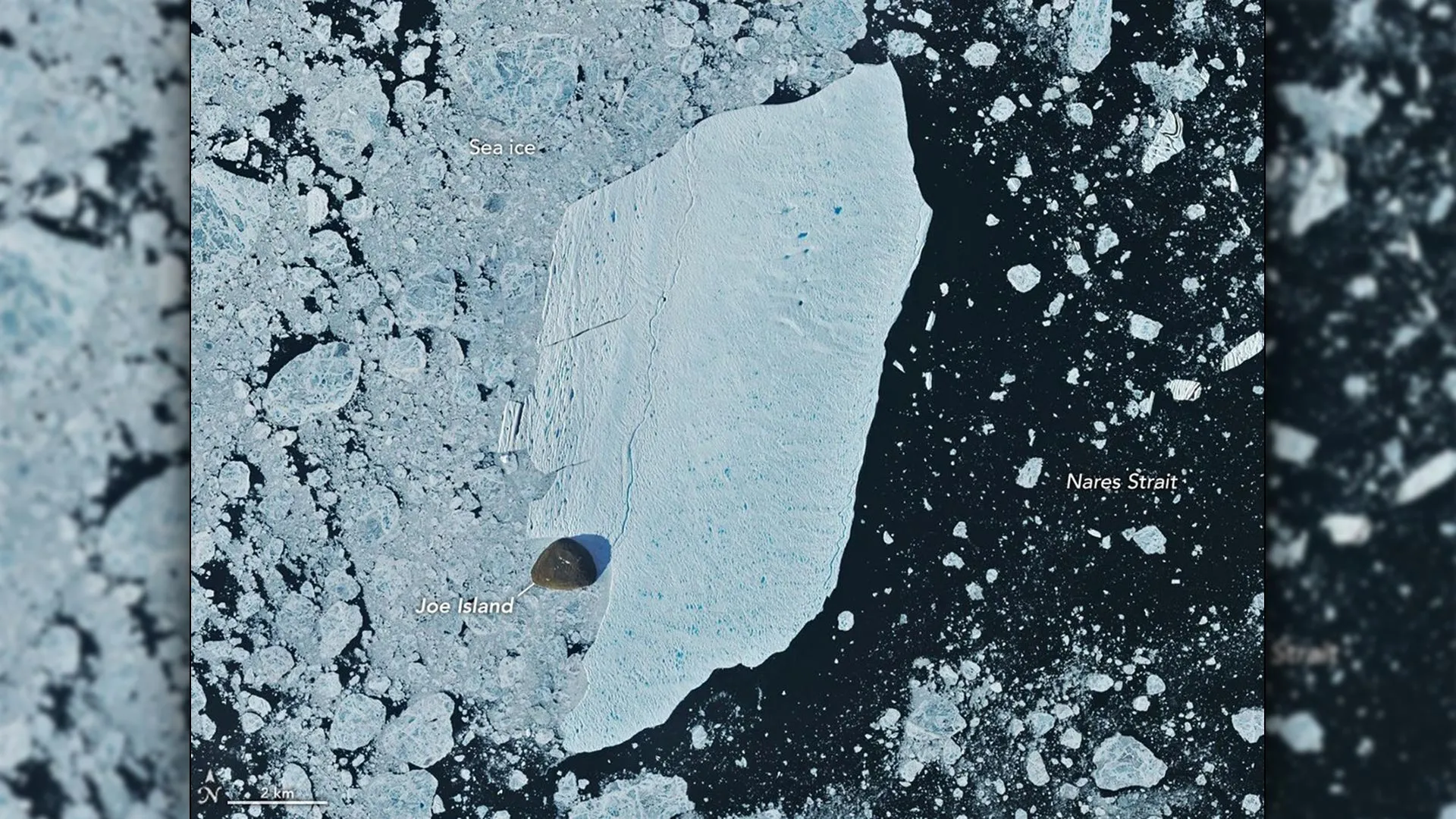 Giant Greenland iceberg slams into Joe Island and survives
