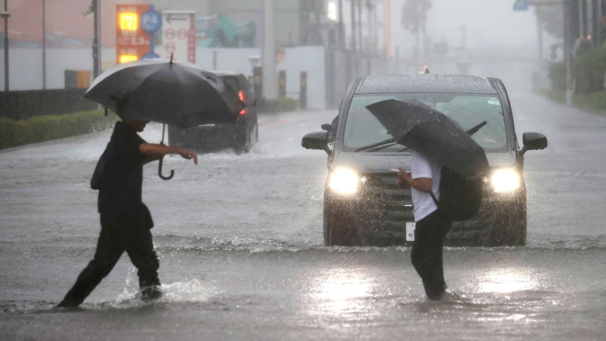 Millions urged to evacuate as powerful Typhoon Dujuan hits Japan