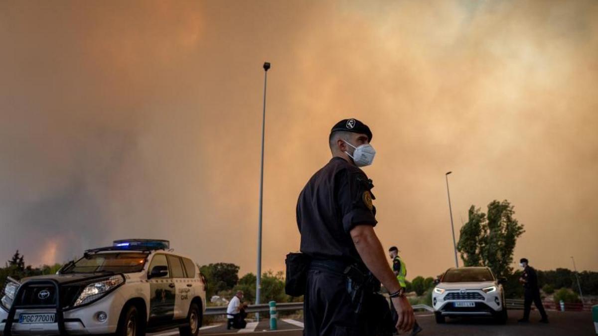 Firefighters struggle to contain Madrid wildfires, as more than 160,000 evacuated in France and Spain