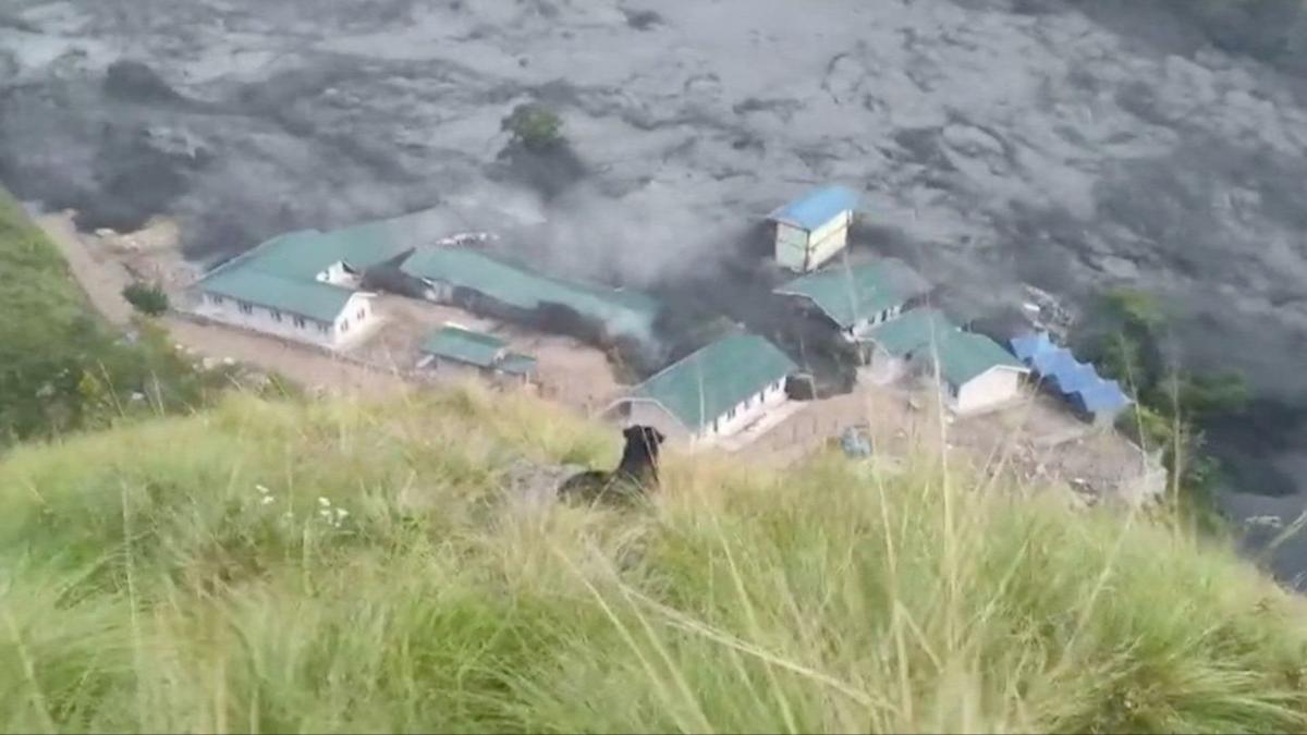 Homes and bridges swept away as fresh floods hit Nepal