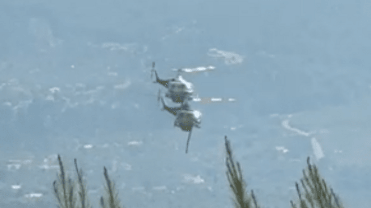 Two crew killed as British pilot survives after firefighting helicopters collide in Greece